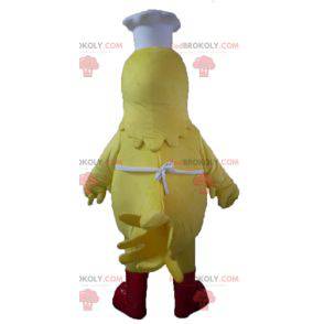 Gigantyczna żółta kura maskotka przebrana za szefa kuchni -