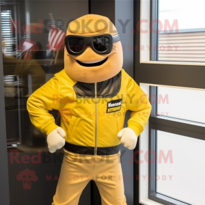 Yellow Special Air Service mascot costume character dressed with a Biker Jacket and Sunglasses