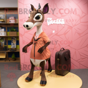 Peach Okapi mascot costume character dressed with a Sheath Dress and Messenger bags