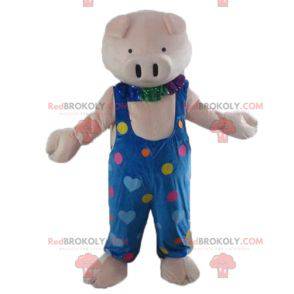 Rosa Schweinemaskottchen in blauen Overalls mit farbigen Herzen