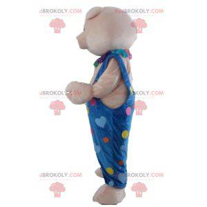 Rosa Schweinemaskottchen in blauen Overalls mit farbigen Herzen