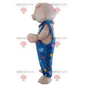 Mascotte roze varken in blauwe overall met gekleurde harten -