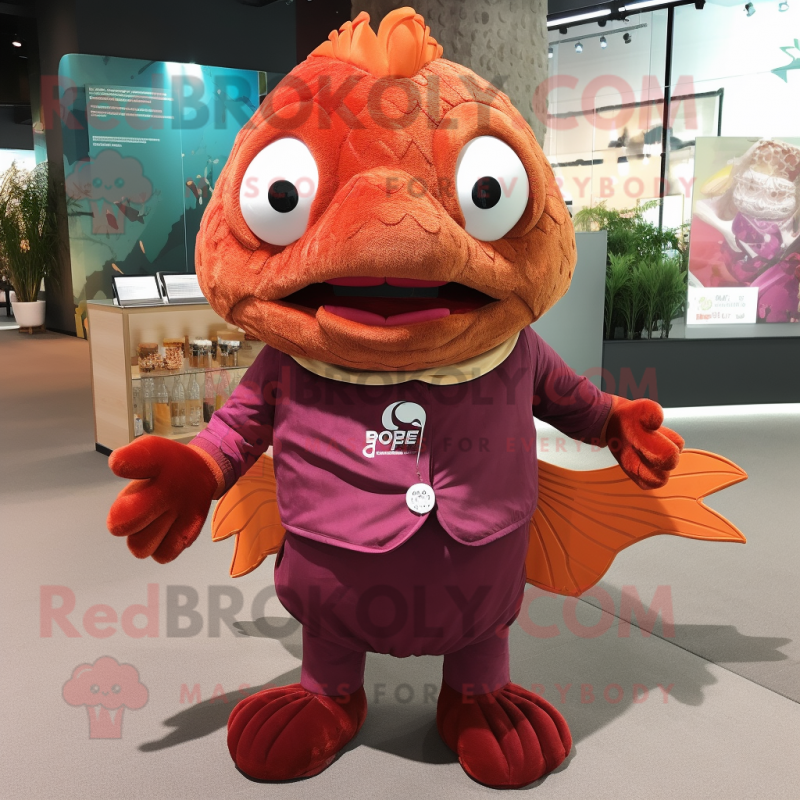 Maroon Goldfish mascot costume character dressed with a Vest and Shawls