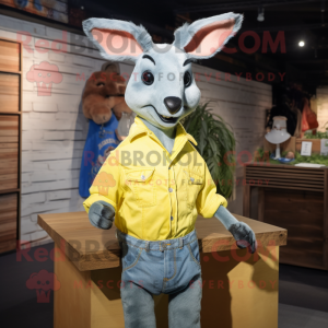 Lemon Yellow Kangaroo mascot costume character dressed with a Denim Shirt and Hairpins