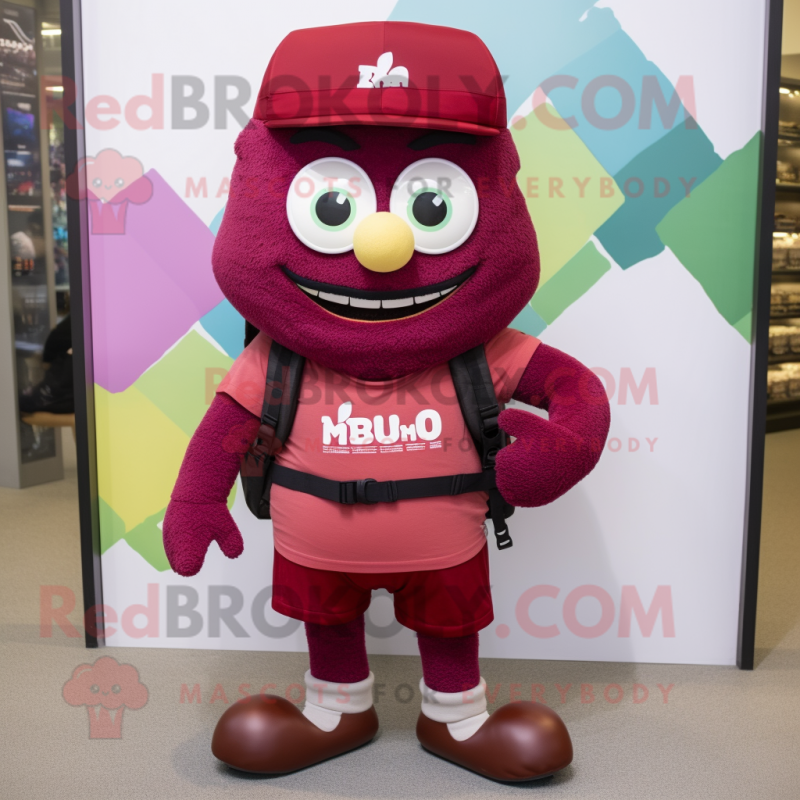 Maroon Pho mascot costume character dressed with a Rash Guard and Backpacks Maroon Pho mascot costume character dressed with a Rash Guard and Backpacks