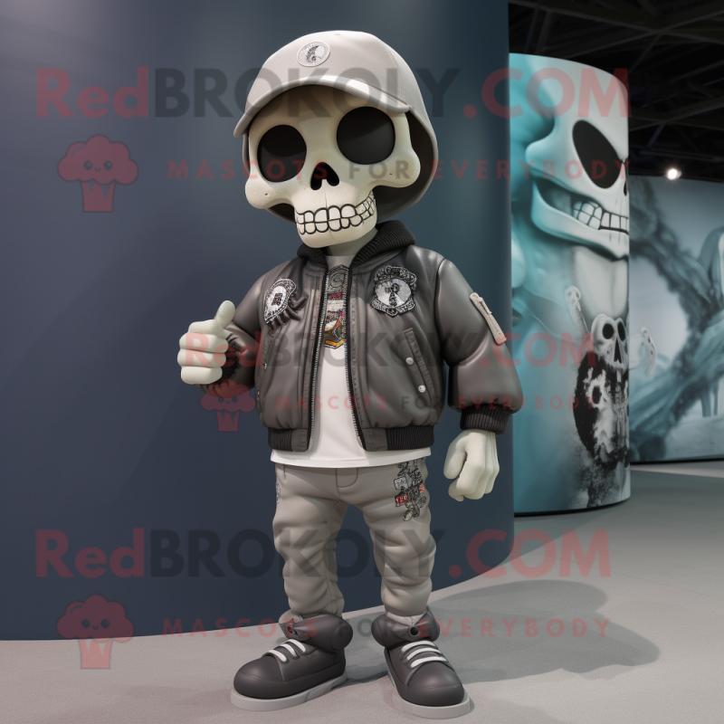 Gray Skull mascot costume character dressed with a Bomber Jacket and Shoe laces Gray Skull mascot costume character dressed with a Bomber Jacket and Shoe laces
