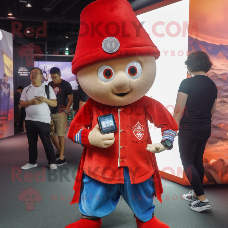 Red Magician mascot costume character dressed with a Denim Shorts and Smartwatches Red Magician mascot costume character dressed with a Denim Shorts and Smartwatches