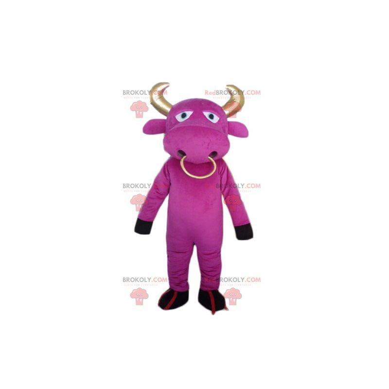 Mascotte mucca rosa con le corna e un anello d'oro -