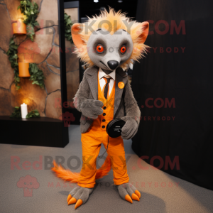 Orange Aye-Aye mascot costume character dressed with a Suit Jacket and Shoe laces