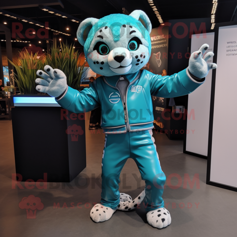 Turquoise Cheetah mascot costume character dressed with a Moto Jacket and Foot pads Turquoise Cheetah mascot costume character dressed with a Moto Jacket and Foot pads