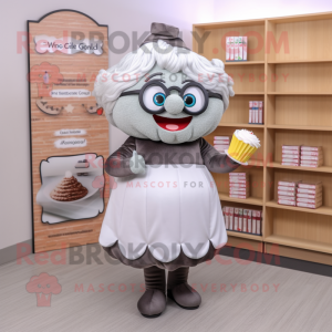 Gray Cupcake mascot costume character dressed with a Maxi Dress and Reading glasses