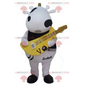 Black and white cow mascot with a yellow guitar - Redbrokoly.com