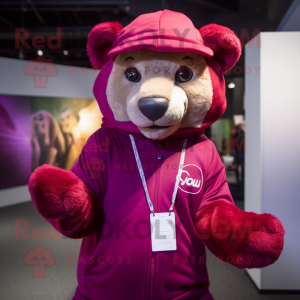 Magenta Mountain Lion mascot costume character dressed with a Romper and Beanies