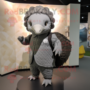Gray Pangolin mascot costume character dressed with a Blouse and Messenger bags