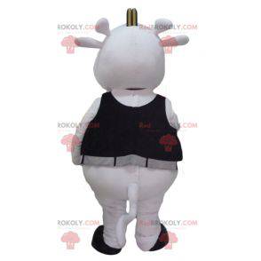 Black and white cow mascot with a yellow guitar - Redbrokoly.com