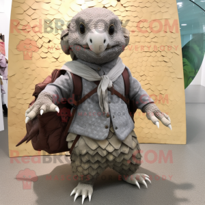Gray Pangolin mascot costume character dressed with a Blouse and Messenger bags