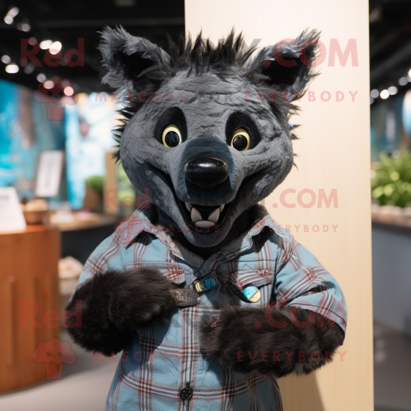 Black Hyena mascot costume character dressed with a Chambray Shirt and Rings