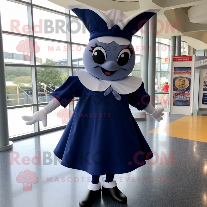 Navy Ray mascot costume character dressed with a Midi Dress and Shoe laces Navy Ray mascot costume character dressed with a Midi Dress and Shoe laces