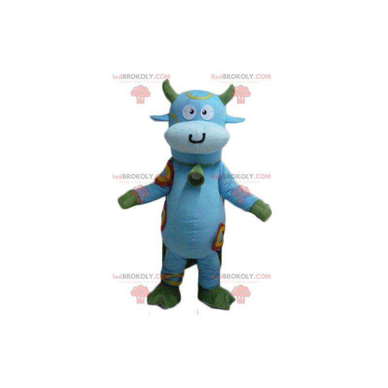 Blue and green cow mascot with a bell around its neck -