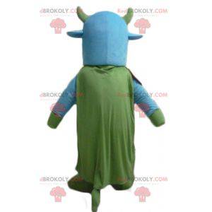 Mascotte blauwe en groene koe met een bel om zijn nek -