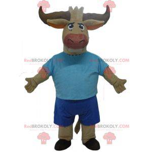 Mascote do búfalo do touro marrom vestido de azul -