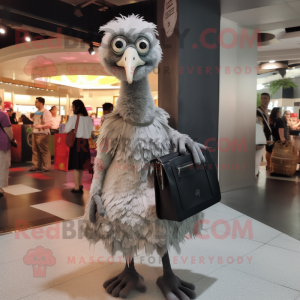 Silver Ostrich mascot costume character dressed with a A-Line Skirt and Messenger bags
