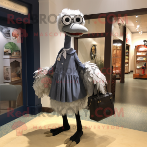 Silver Ostrich mascot costume character dressed with a A-Line Skirt and Messenger bags