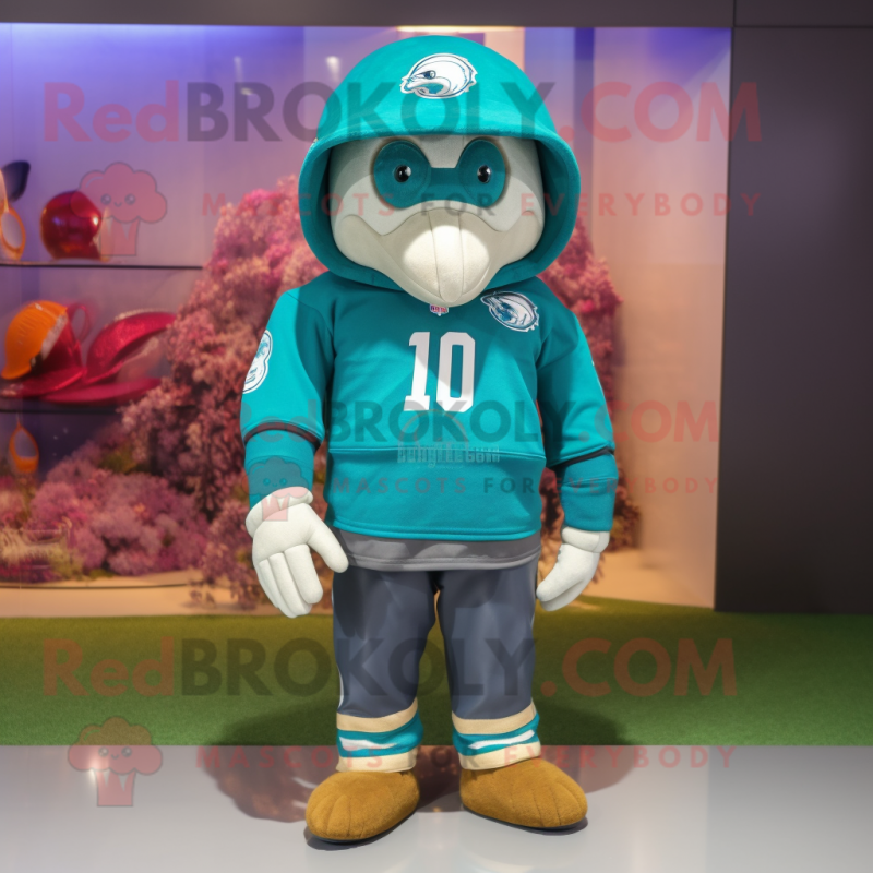 Turquoise American Football Helmet mascot costume character dressed with a Hoodie and Hats Turquoise American Football Helmet mascot costume character dressed with a Hoodie and Hats