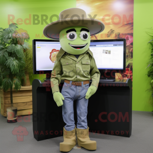 Olive Computer mascot costume character dressed with a Jeans and Hats
