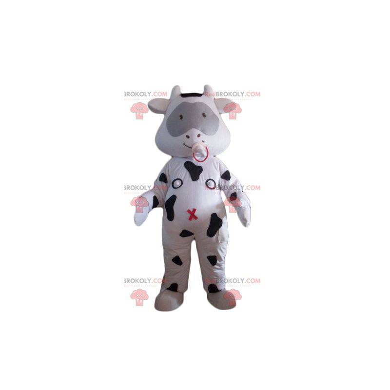 Mascotte mucca bianca e nera con un ciuccio - Redbrokoly.com