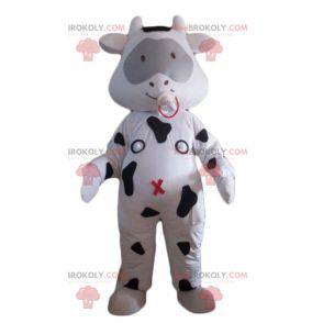 Vaca mascote branca e preta com chupeta - Redbrokoly.com