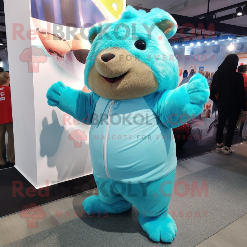 Cyan Guinea Pig mascot costume character dressed with a Bikini and Mittens