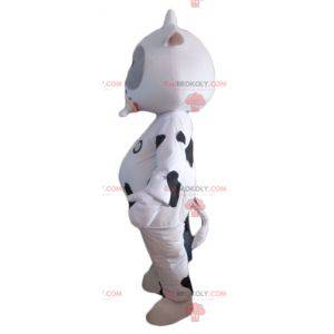 Vaca mascote branca e preta com chupeta - Redbrokoly.com