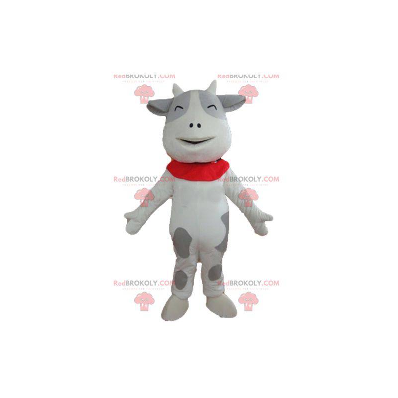 Mascota de vaca blanca y gris alegre y conmovedora -