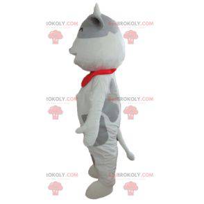 Mascote da vaca branca e cinza alegre e tocante - Redbrokoly.com