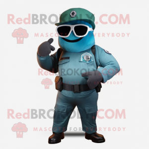 Teal Commando mascot costume character dressed with a Jeans and Eyeglasses