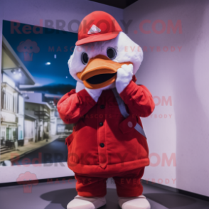 Red Goose mascot costume character dressed with a Corduroy Pants and Mittens