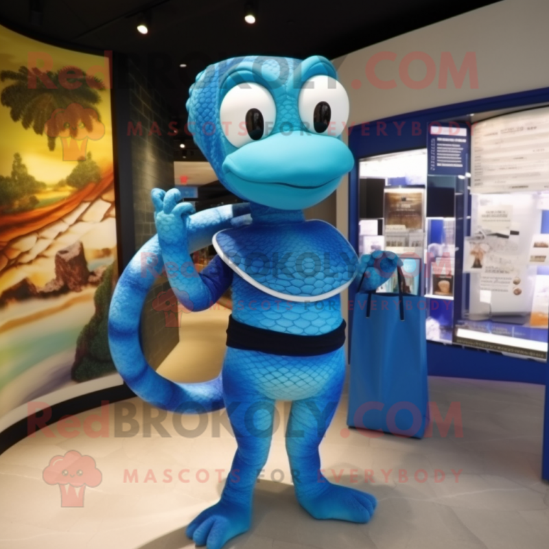 Blue Snake mascot costume character dressed with a Rash Guard and Handbags