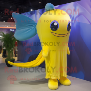 Yellow Blue Whale mascot costume character dressed with a Flare Jeans and Hair clips