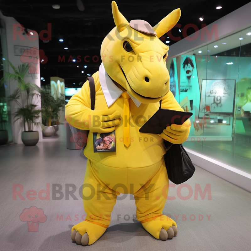 Yellow Rhinoceros mascot costume character dressed with a Bodysuit and Wallets Yellow Rhinoceros mascot costume character dressed with a Bodysuit and Wallets