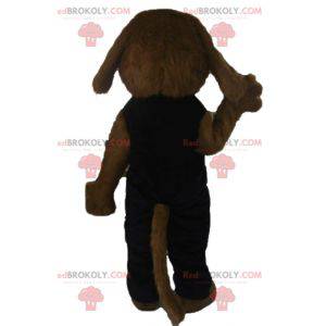 Mascotte de chien marron tout poilu en tenue noire -