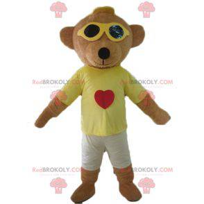 Brown teddy bear mascot in colorful outfit with glasses -