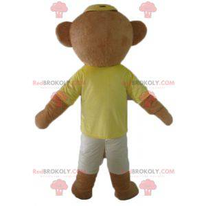 Mascotte bruine teddybeer in kleurrijke outfit met bril -