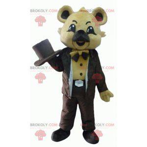 Mascota koala beige en traje marrón con sombrero -