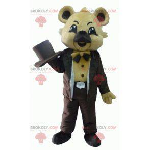 Beige koala mascotte in bruin kostuum met een hoed -