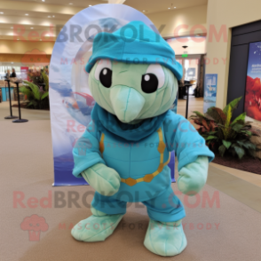 Turquoise Sea Turtle mascot costume character dressed with a Corduroy Pants and Headbands