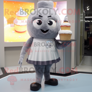 Gray Cupcake mascot costume character dressed with a Mini Skirt and Bracelet watches