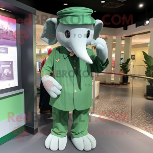 Green Elephant mascot costume character dressed with a Button-Up Shirt and Berets
