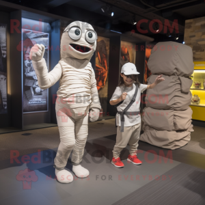 Gray Mummy mascot costume character dressed with a Cargo Shorts and Smartwatches