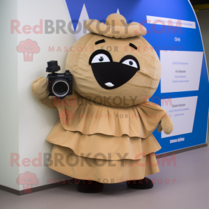 Tan Camera mascot costume character dressed with a Ball Gown and Backpacks